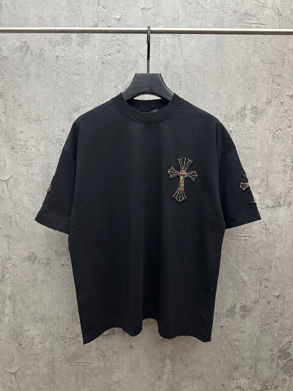 Black short-sleeve T-shirt with colorful cross embroidery on left chest