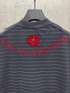 Navy striped short-sleeve crewneck shirt with red flower and script embroidery