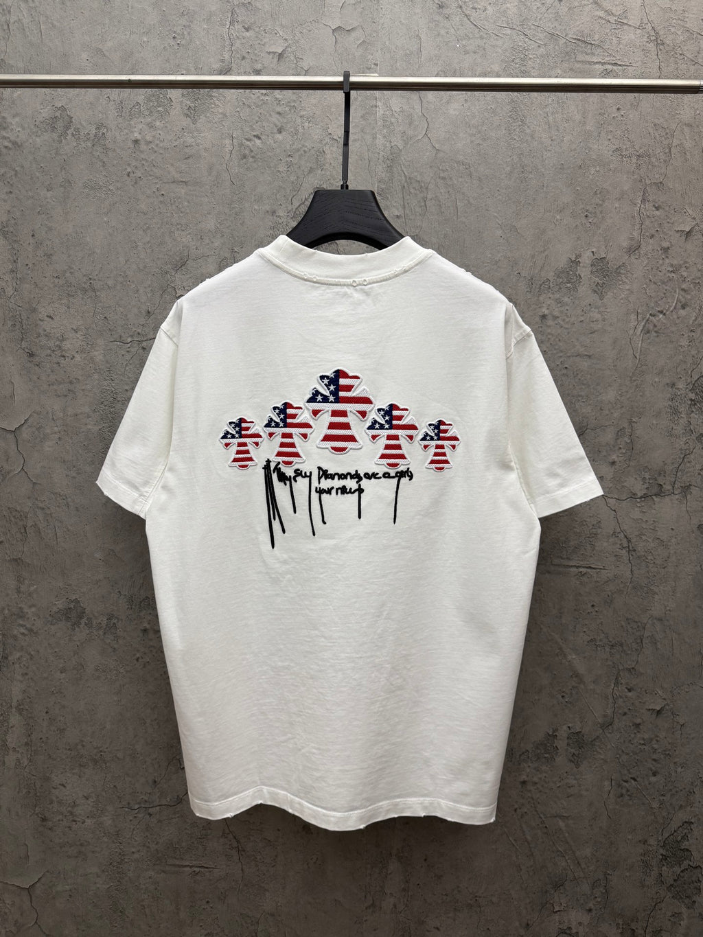 White short-sleeve T-shirt with large back graphic of patriotic figures and drips