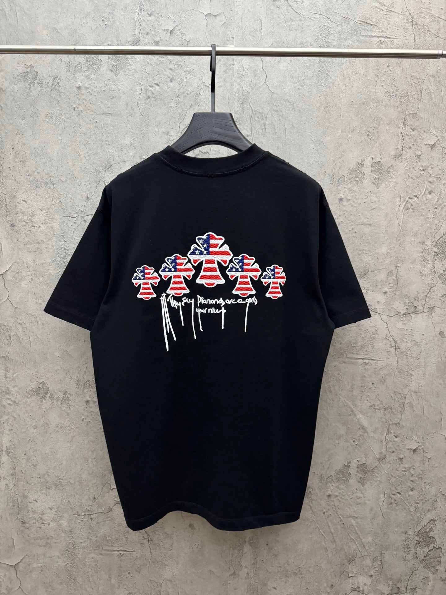 Black short-sleeve T-shirt with large USA angel graphic on the back