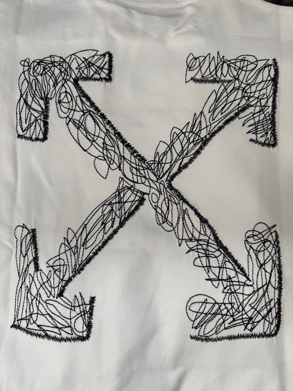 Off-White T-shirt in off-white with full front black X-style graphic