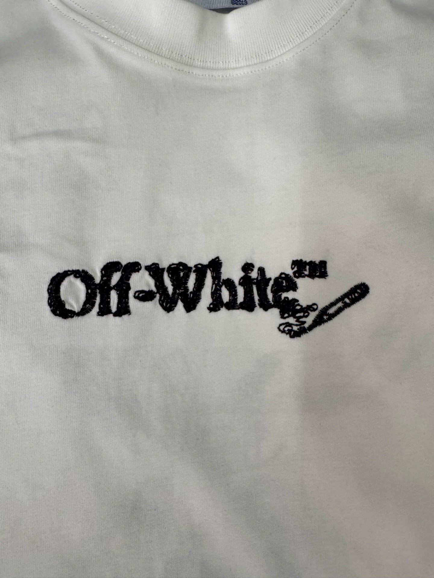 Off-White T-shirt chest logo print in black on off-white fabric