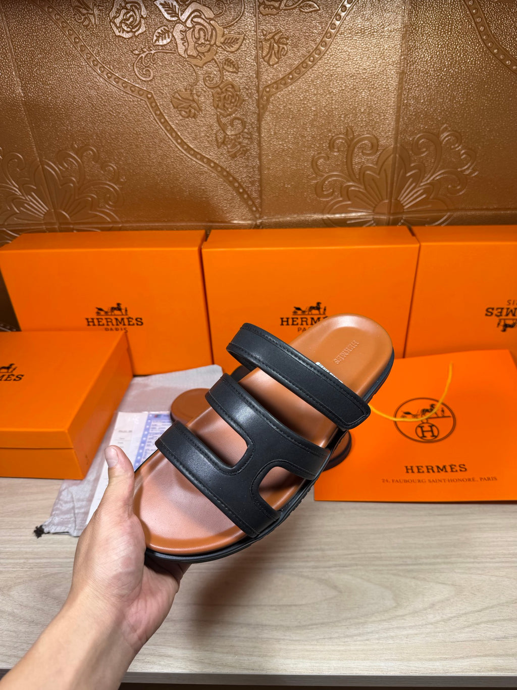 Hermes dark leather slide sandal with double cross straps, open toe