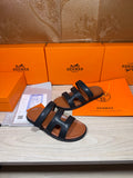 Hermes dark leather slide sandals with two thick strap bands