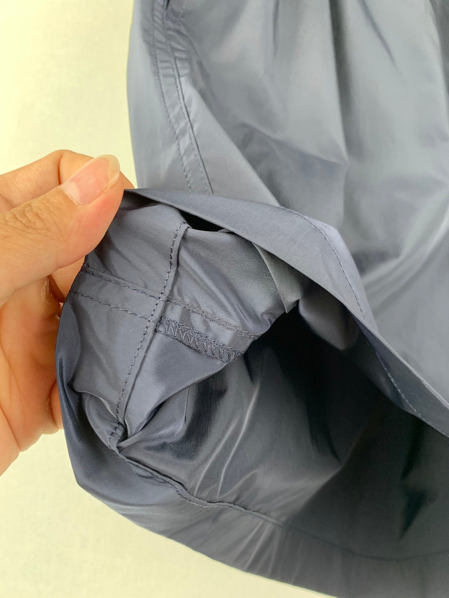 Moncler pants fabric fold close-up with inner seam detail