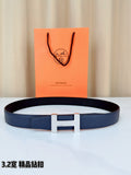 Blue leather belt with silver-tone H buckle and rectangular prong detail