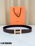 Dark brown leather belt with gold-tone H buckle and textured strap