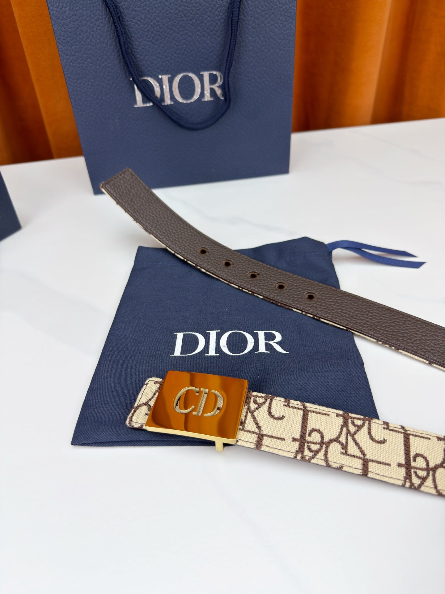 Dior belt with dark brown leather end, beige monogram section, gold-tone 'CD' buckle