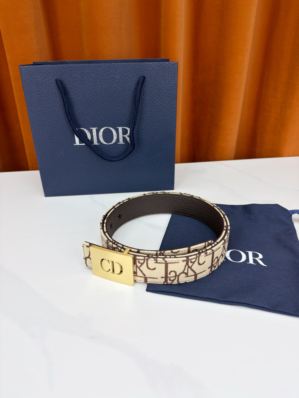 Dior belt on cloth with beige monogram strap and gold-tone 'CD' buckle
