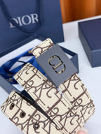 Dior belt detail with beige monogram canvas and black CD buckle
