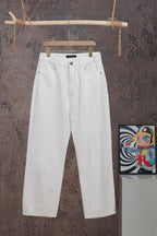 White Louis Vuitton pants on hanger, front button and belt loops