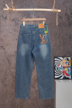 Light blue denim pants with front pockets and LV patch on back