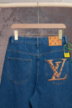 Louis Vuitton blue denim pants with back patch pocket and luggage-tag detail