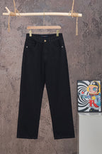 Black denim pants with waistband button closure, hanging on a wooden hanger