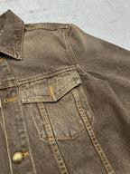 Dark gray denim jacket chest yoke and snap flap pocket detail