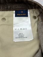 Inside label on beige denim jeans with size 29 and care instructions