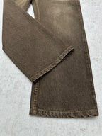 Brown denim jeans folded detail with stitched hem and side seam