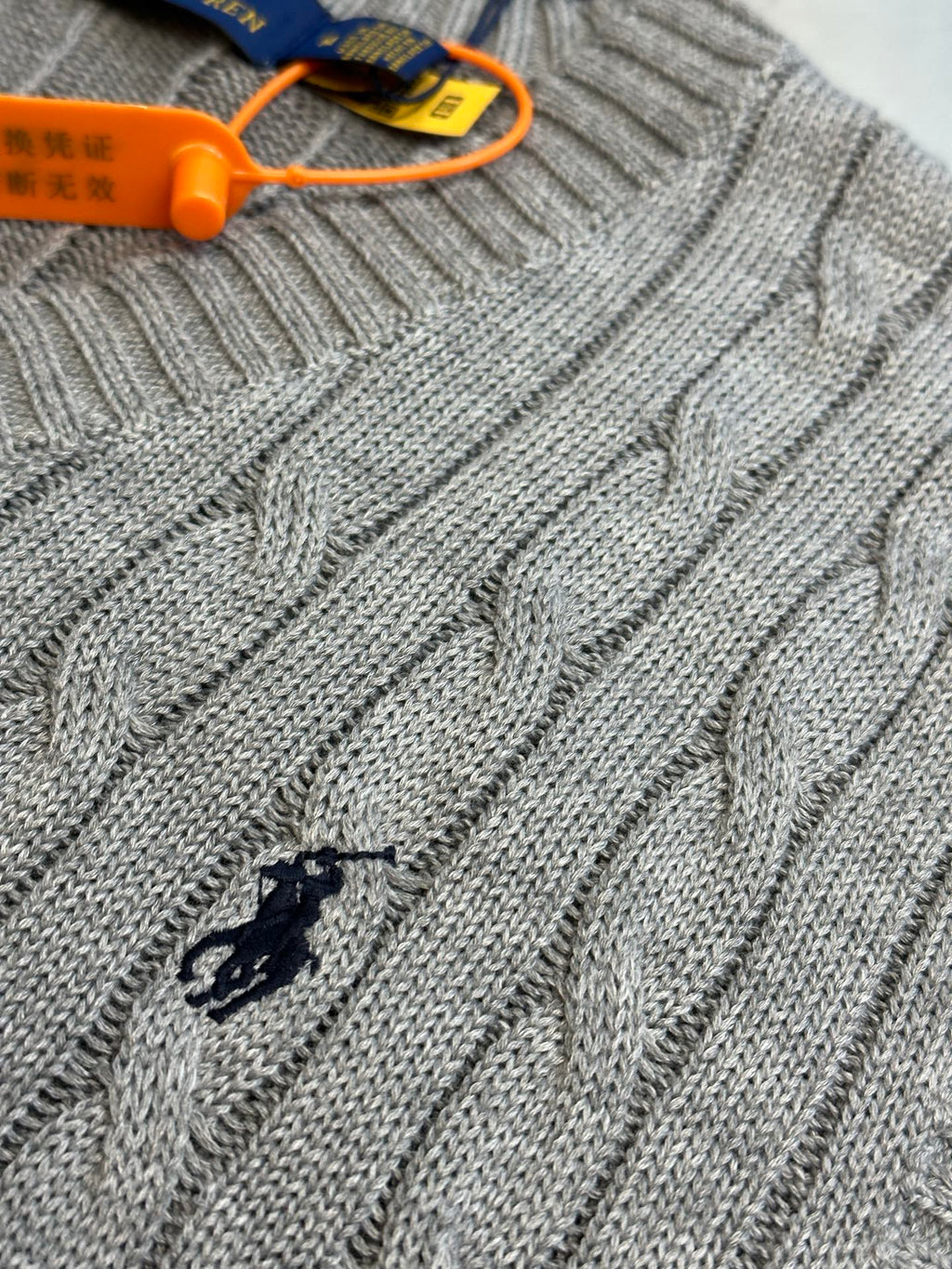 Gray cable-knit V-neck sleeveless sweater vest with embroidered Polo logo
