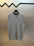 Gray cable-knit sweater vest with V-neck and sleeveless design
