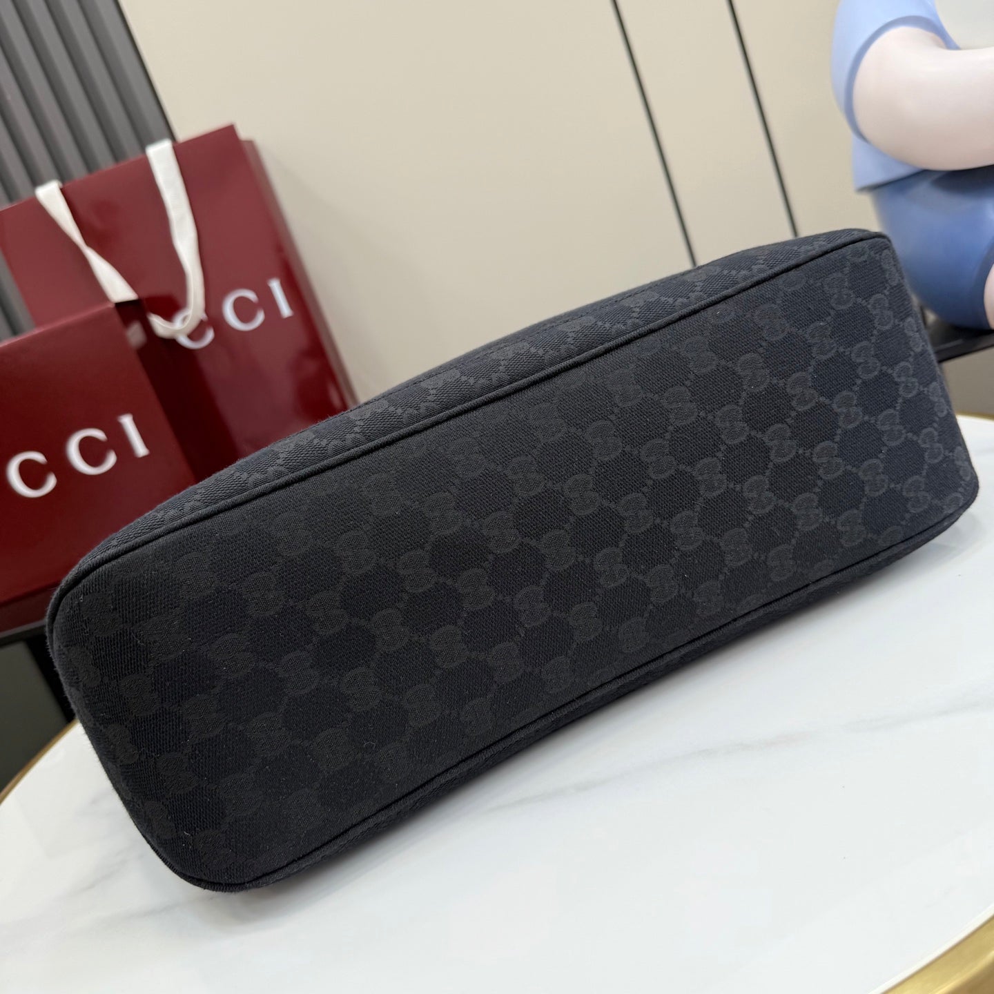 Gucci tote bag flat side profile in dark GG monogram canvas with leather trim