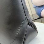 Gucci black leather tote bag corner with side seam and curved stitching