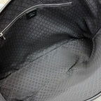 Gucci tote bag interior with dark patterned fabric lining