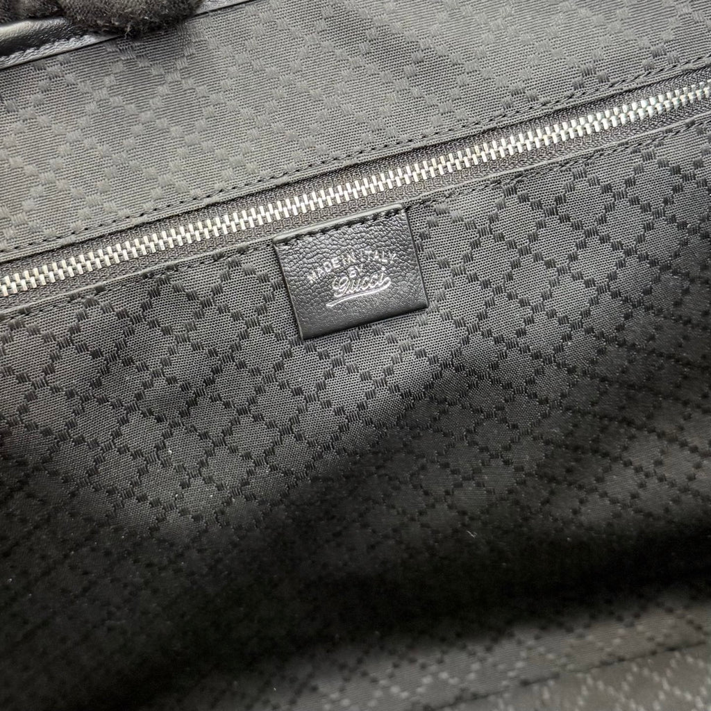 Gucci tote bag inner logo patch on patterned zip pocket
