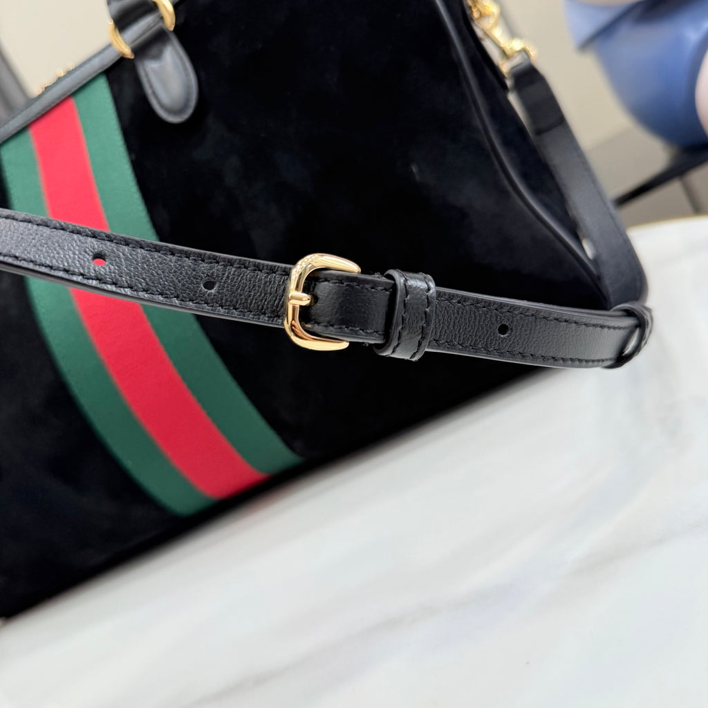 Gucci bag strap with gold buckle, dark gray leather and perforations