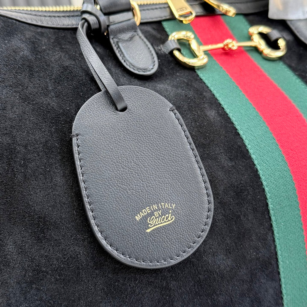 Gucci bag leather luggage tag with Made in Italy and Gucci logo