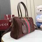 Gucci handbag with dark brown body, green and red web stripe, two handles and shoulder strap