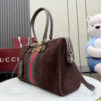 Gucci handbag on dark brown suede with green and red web stripe and side profile seam