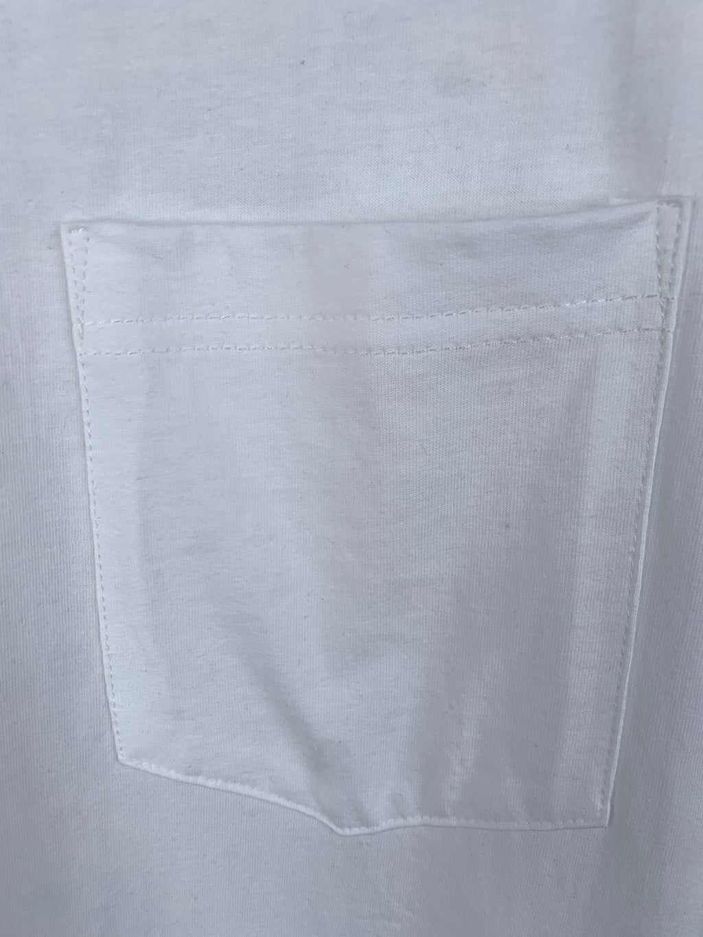 White T-shirt chest pocket detail