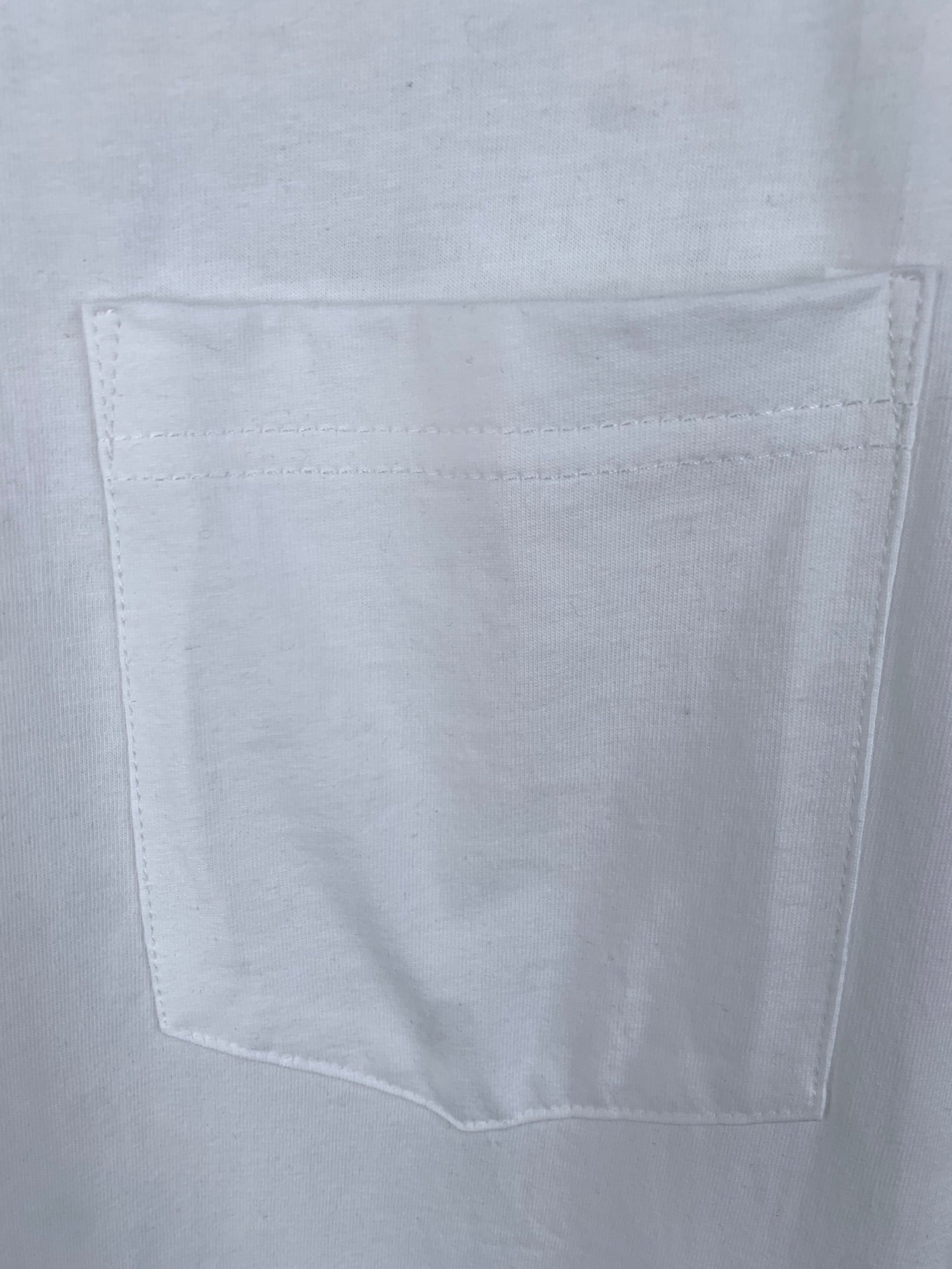 White T-shirt chest pocket detail