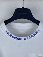 White T-shirt with blue printed collar trim and Louis Vuitton neck logo