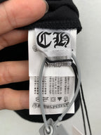 Louis Vuitton black T-shirt neck tag with size label and care symbols