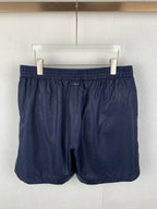 Louis Vuitton monogram shorts front with center seam, dark navy
