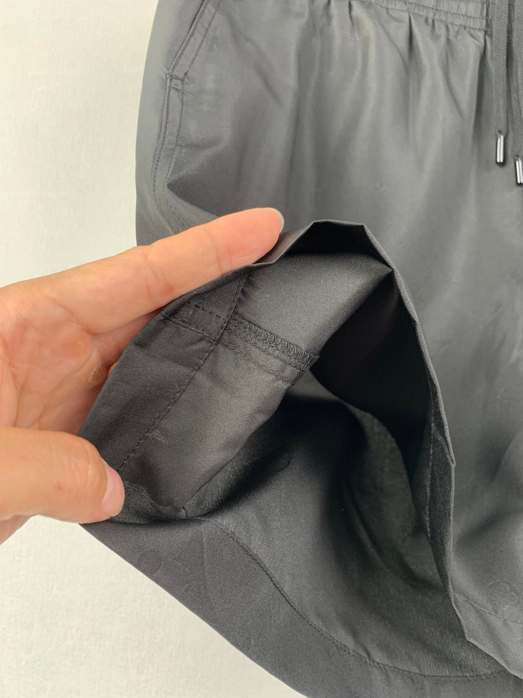 Louis Vuitton black shorts inner pocket and fabric lining seam