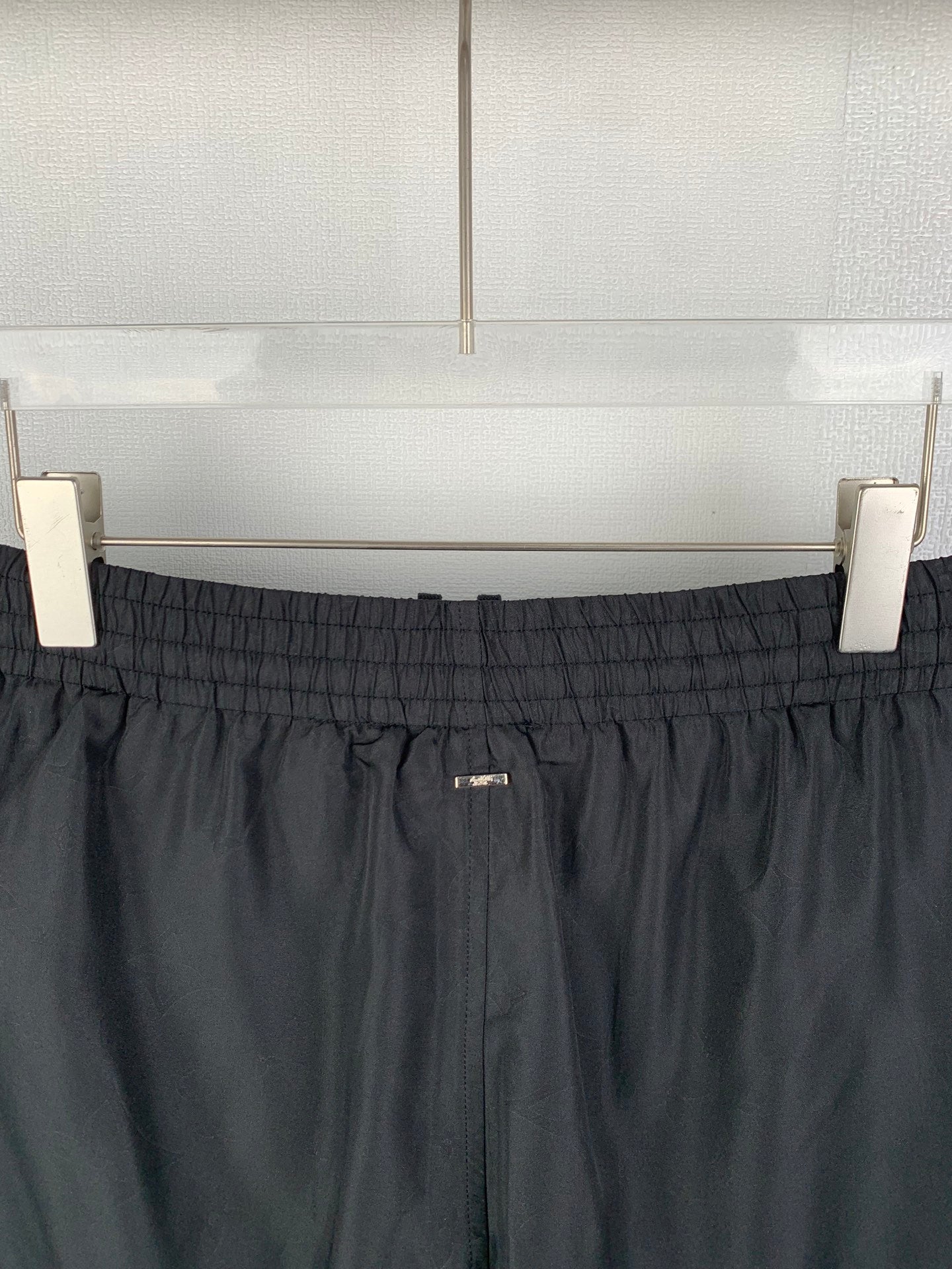 Louis Vuitton black elastic waistband shorts with drawstring and small logo tag