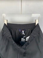 Louis Vuitton black shorts interior view with drawstring and mesh lining