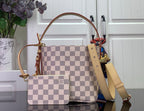 Louis Vuitton Damier checkered tote bag with tan leather handles and detachable pouch