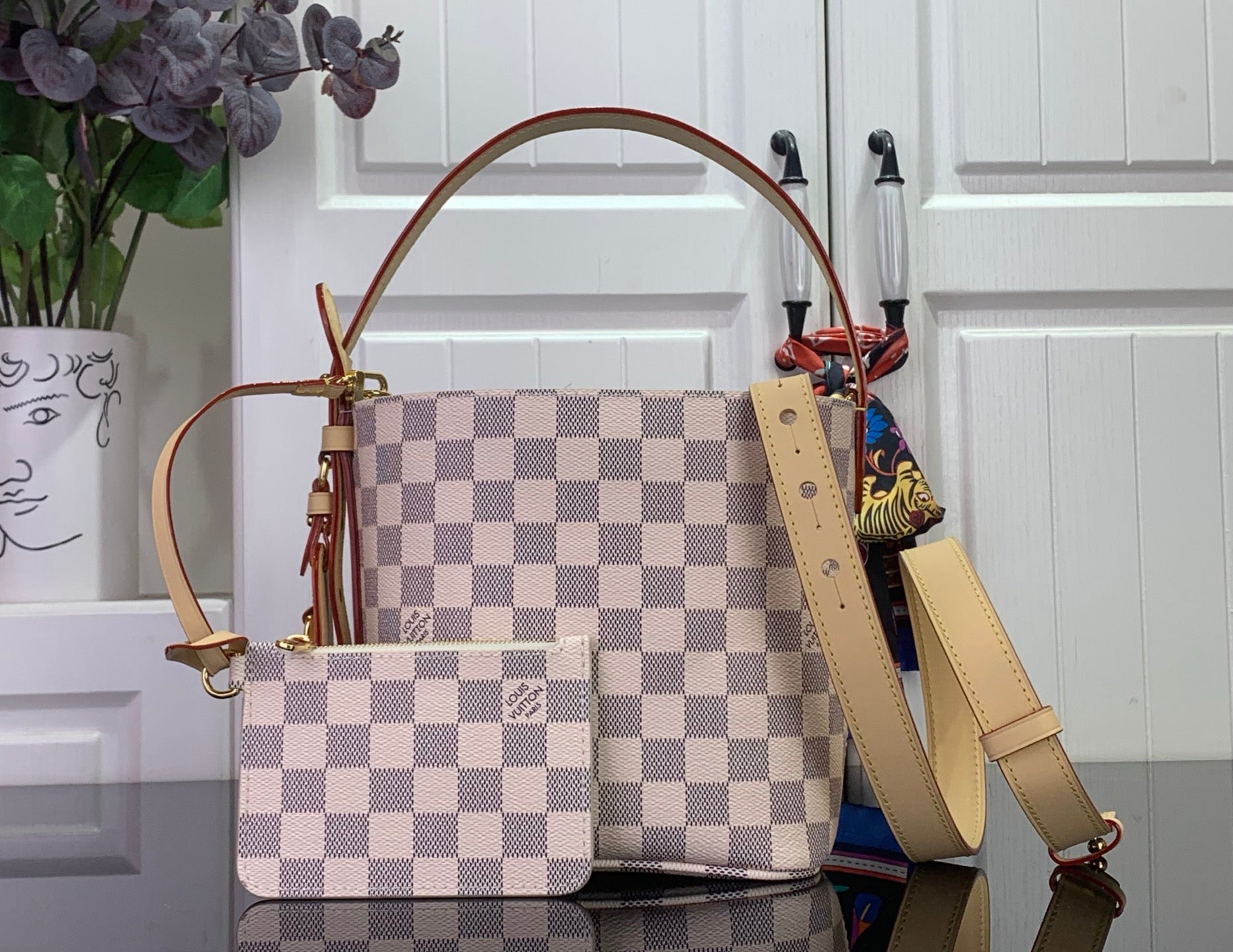 Louis Vuitton Damier checkered tote bag with tan leather handles and detachable pouch
