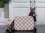 Louis Vuitton checkered mini bag with zipper top and leather wrist strap