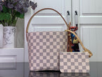 Louis Vuitton Damier checkered tote with front pouch and tan trim, front view