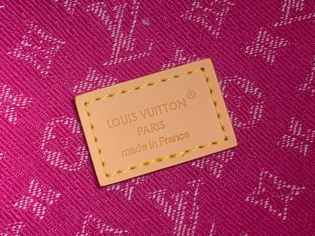 Louis Vuitton Paris logo label on purple monogram fabric bag