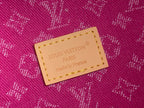 Louis Vuitton Paris logo label on purple monogram fabric bag