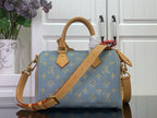 Louis Vuitton monogram bag, blue with tan leather crossbody strap and top handle