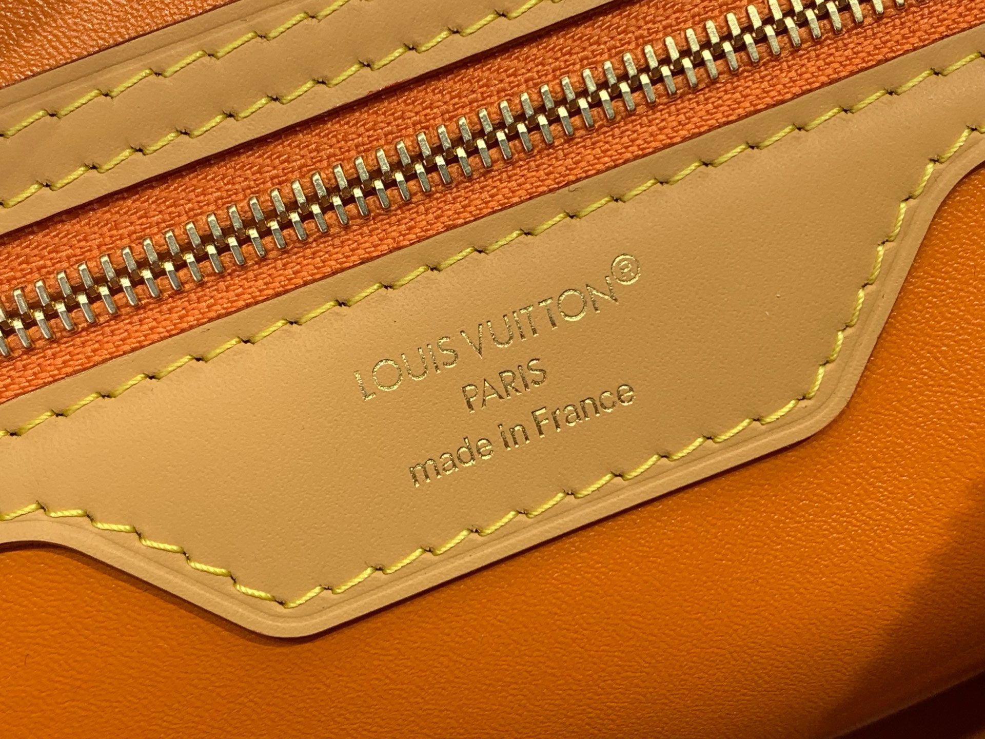 Louis Vuitton bag leather logo patch, tan with stitched edges