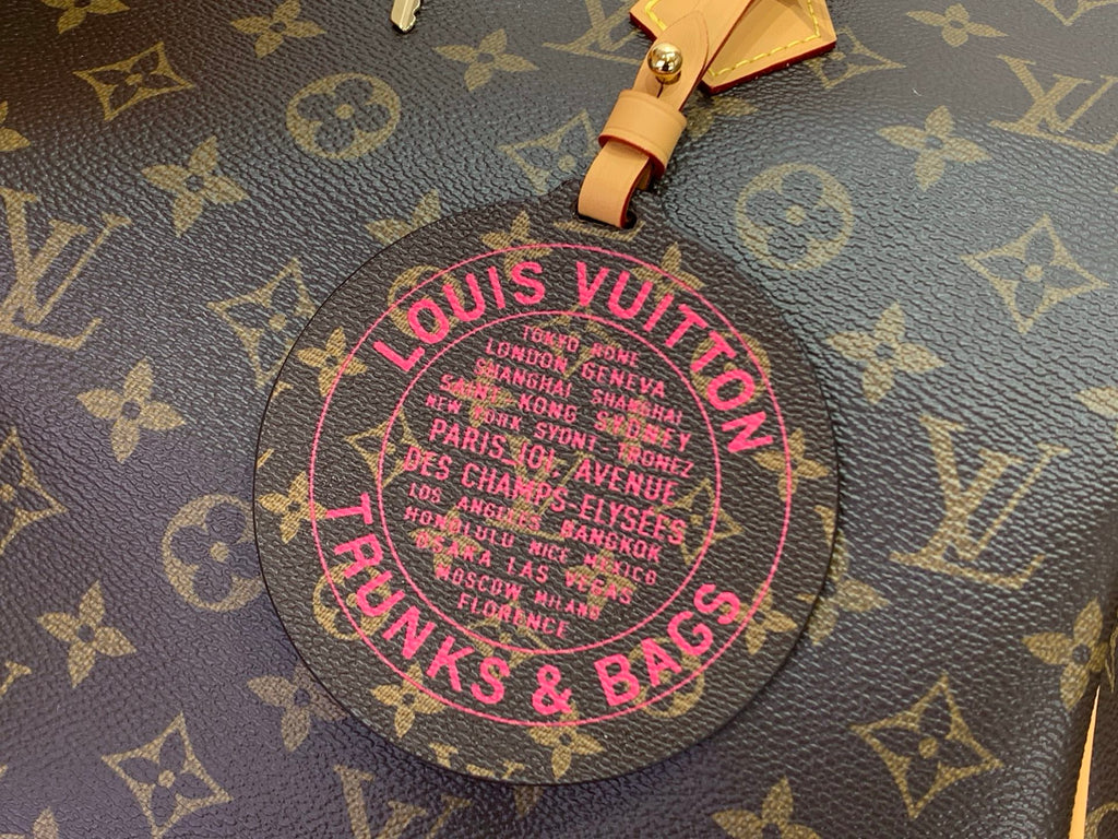 Louis Vuitton monogram bag with circular “THANKS & BAGS” stamp label