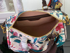Louis Vuitton bag with floral print, open top, brown interior, gold zippers