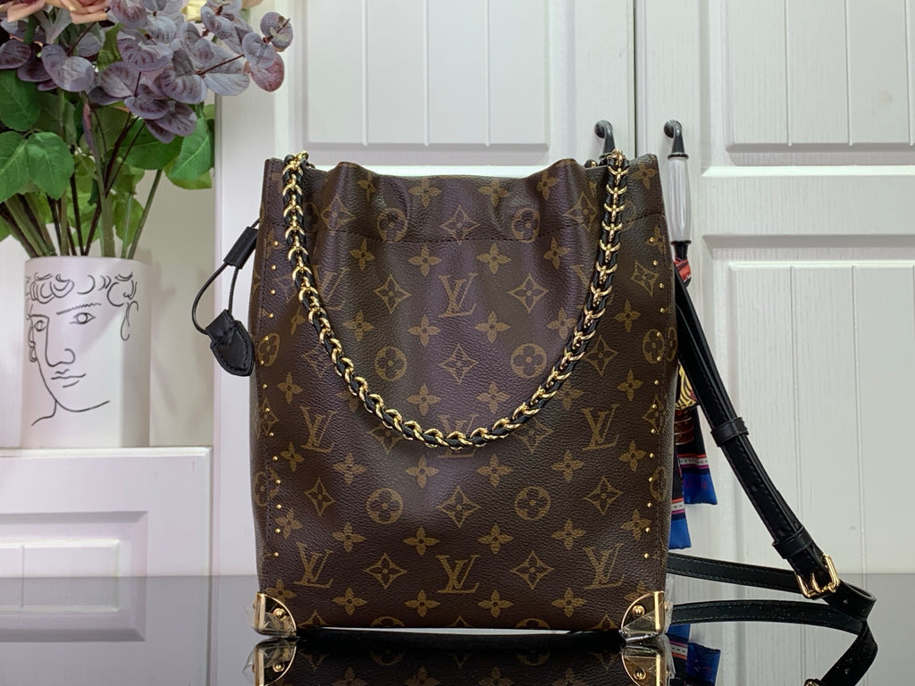 Louis Vuitton monogram bag with chain shoulder strap, dark brown front